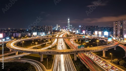 Nighttime Cityscape Captivating Highway Lights and Urban Infrastructure.