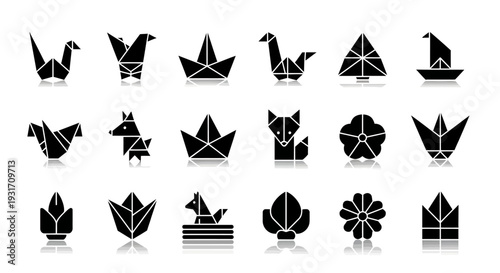 Collection of black origami animals and objects on white background viewed from directly above