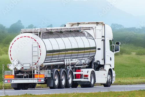 Wallpaper Mural Industrial gasoline tanker driving on main road Torontodigital.ca