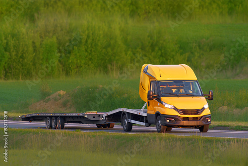 Wallpaper Mural White flatbed tow vehicle ready for emergency Torontodigital.ca