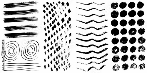 Collection of various black brush strokes and textures on white background