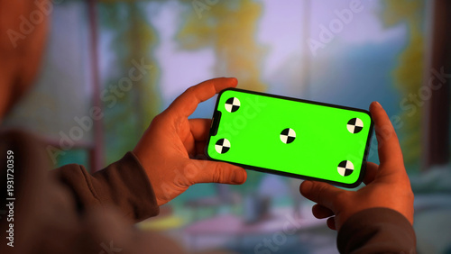 Wallpaper Mural Smartphone held horizontally for immersive gaming Torontodigital.ca