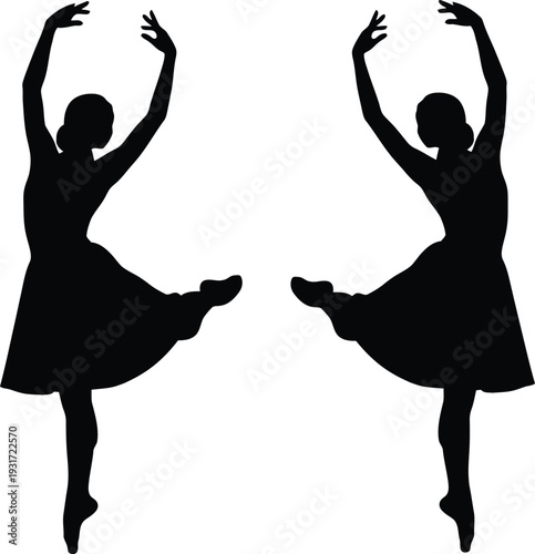 Silhouette of two ballet dancers in mid performance