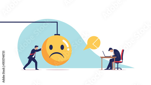 Sad businessman working at desk is confronted with a giant frowning face pushed by another corporate employee.