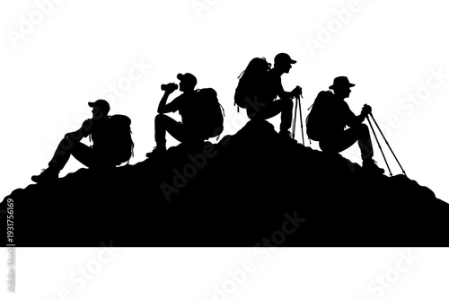 Silhouettes of male hikers resting on mountain summit.