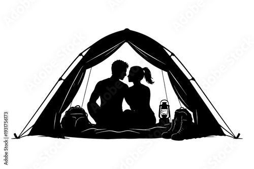 Silhouette of couple sitting in tent.