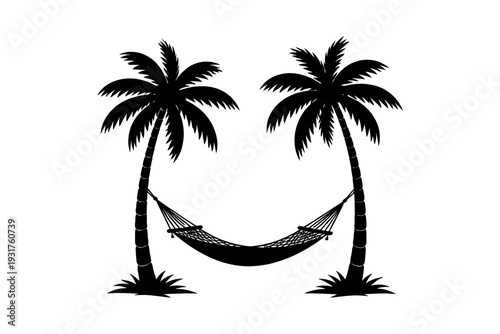 Silhouette of hammock suspended between two palm trees.