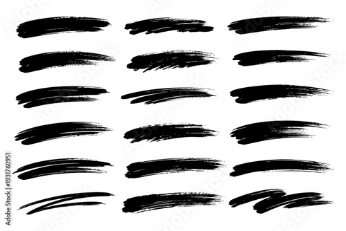 Set of black brush strokes on white background for artistic design.
