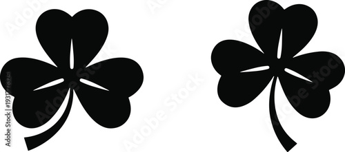 Set of Two Black Shamrock Silhouette Icons Isolated on White Background Representing Saint Patrick's Day Good Luck Irish Heritage Nature Three Leaf Clover Symbol and Traditional Ireland Celebration