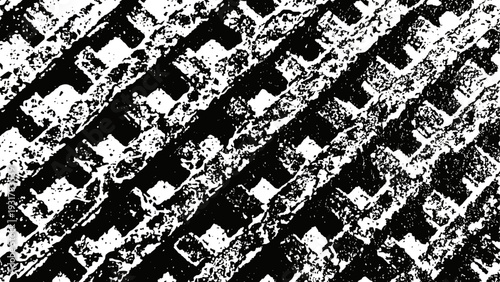Close up of diagonal tire tread pattern in high contrast black and white texture