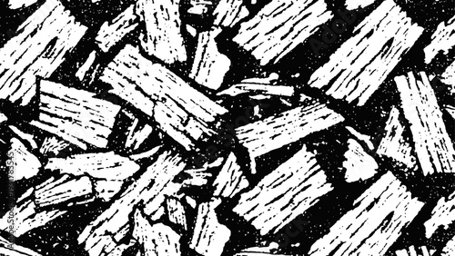 Charcoal pieces arranged in a random pattern, texture background with natural wood grain details