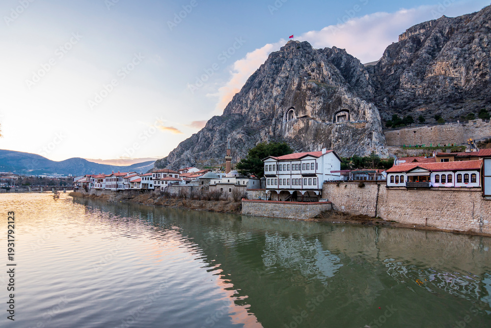 Fototapeta premium Old Ottoman houses night panoramic view by the Yesilirmak River in Amasya City. Amasya is populer tourist destination in Turkey.