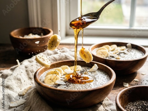 Honey Drizzling on Banana Chia Pudding in Rustic Wooden Bowl