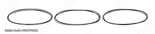 A set of three thin metal rings on a white background