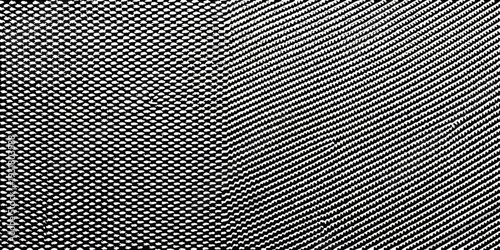 Abstract black and white pattern with diagonal and dotted textures