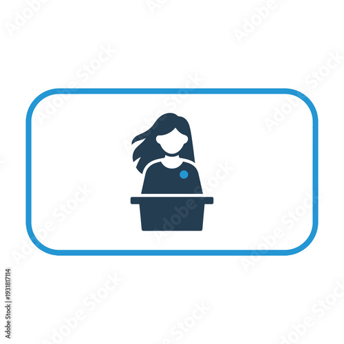 Confident woman in professional attire speaking at a podium during a presentation in a minimalist blue framed environment