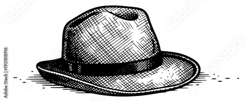 Soccer ball in grass field with silhouettes of players