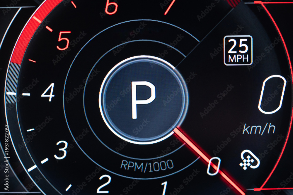 Fototapeta premium Close up of car dashboard in park mode with digital speedometer