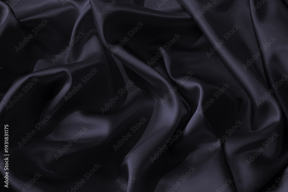 Fototapeta premium Black dark blue graphite silk shiny fabric material. Elegant luxury subtle style background. Wavy curve line soft folds drapery . Smoky muted dusty shade color. Empty. Design.