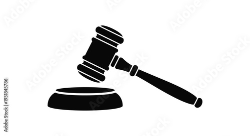 A stark black silhouette of a gavel resting on a sound block representing law and judicial proceedings silhouette high quality professional
