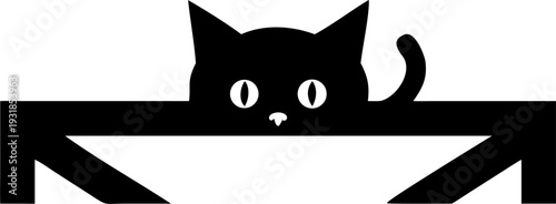 Curious black cat peeking from behind table with wide eyes