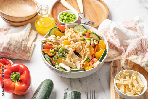 Healthy Asian salad with chicken and wonton strips. Protein packed health food