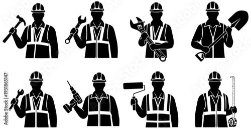 Construction workers with various tools in safety gear