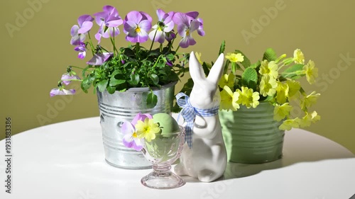 Easter decoration with spring flowers. Slow rotation