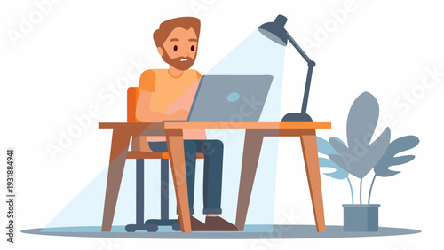 Bearded man working on laptop at wooden desk with lamp and plant