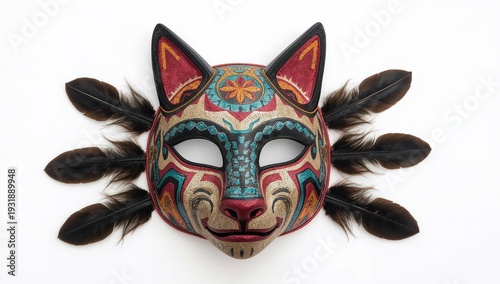 Handmade aztec cat mask replica with feathers and vivid colors representing mesoamerican ritual feline symbolism