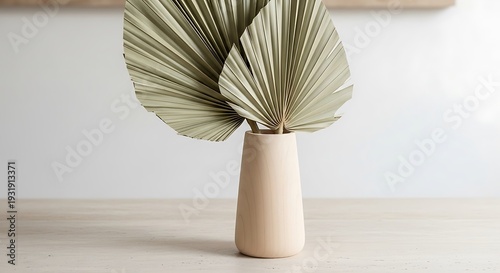 Decorative Vase with Dried Palm Leaves.