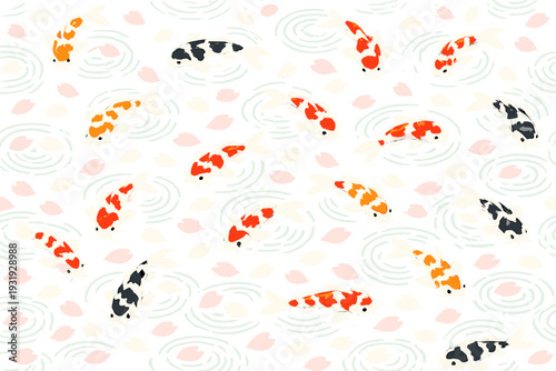 Koi fish swim in rippling water among floating flower petals in a serene pond setting during daylight hours