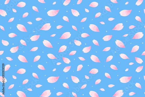 Patterns of pink petals float on a light blue background during spring season in a design that captures the essence of nature