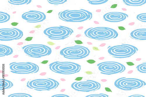 Swirls of blue and green shapes on a white background create a simple design for decoration or crafting projects