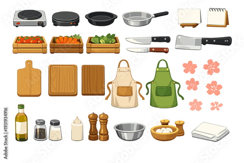 Kitchen tools and ingredients arranged on a table for cooking and meal preparation activities