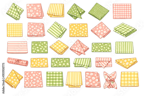 Different types of folded cloths in various colors and patterns on a light background