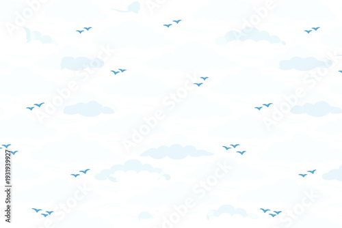 Clouds and birds in a clear sky during daytime