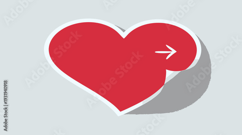 A red heart with an arrow on a sticker with a slight curl and a shadow, on a light gray background