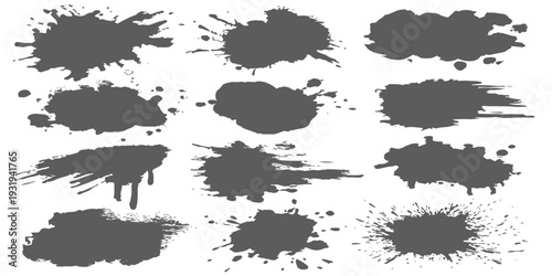 Set of black grunge ink splashes and spray paint splatters isolated on white background for urban design elements
