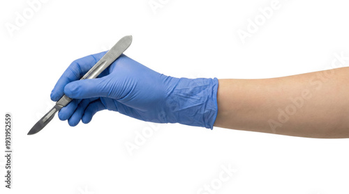 Fotografie Hand in surgical glove holding sharp medical scalpel