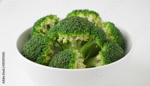 Fresh Green Broccoli Florets Washed and Ready in a White Bowl for Healthy Eating