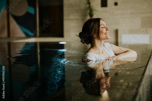 Woman enjoying a swim in a ...