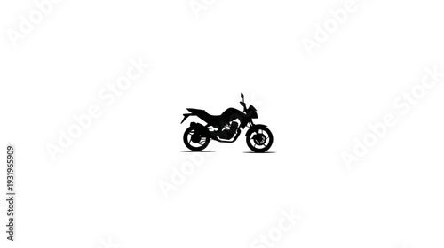 Silhouette image of a motorcycle, shown in side profile, against a stark white backdrop