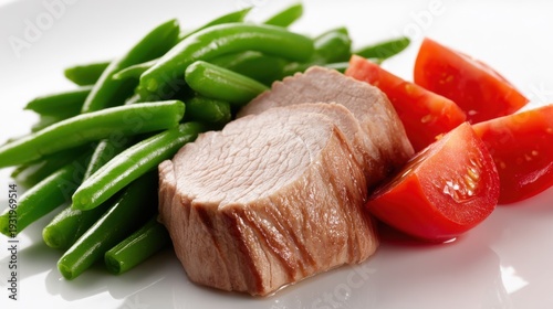 Perfectly Pan-Seared Lean Turkey Cutlets Served With Vibrant Green Beans and Ripe Tomato Wedges