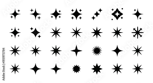 Collection of various starburst and asterisk symbols displayed in a grid pattern on a plain background