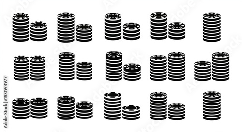Multiple black and white striped cylindrical objects arranged in a grid pattern on a plain surface from a top-down viewpoint.