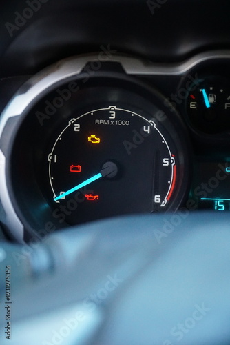 Принти на полотні Close-up of a car dashboard with multiple warning lights illuminated, including check engine, battery, and oil pressure icons, signifying mechanical trouble