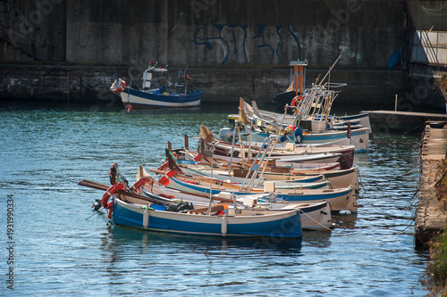 traditional Mediterranean fishing boats in Italy, moored in Nervi harbor