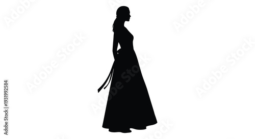 Elegant woman in a flowing gown captured in a dark silhouette