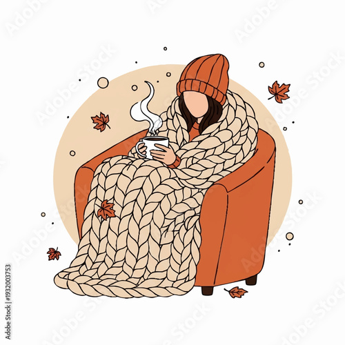 Cozy person wrapped in blanket holding hot drink.
